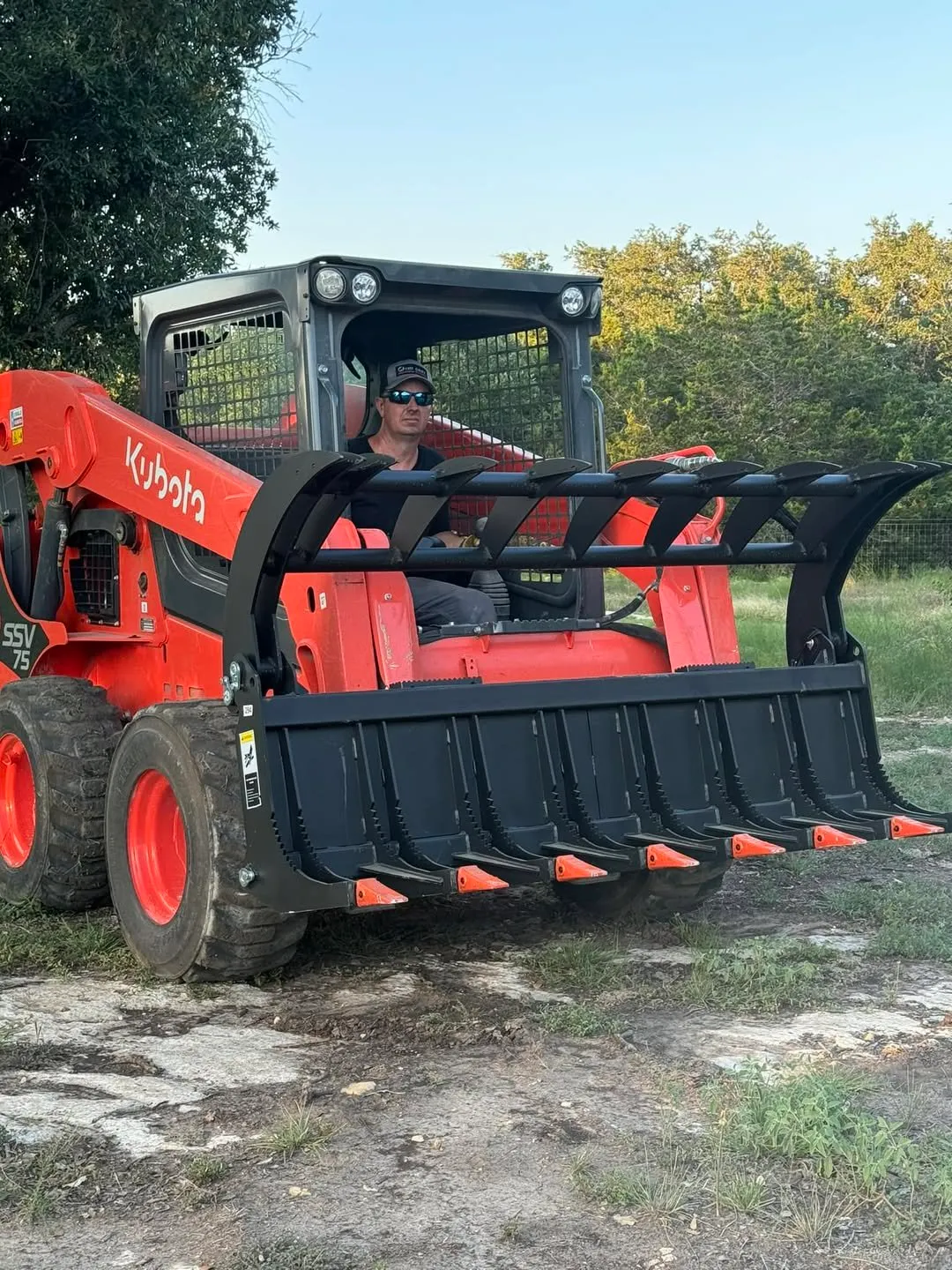 Skid steer handling a heavy-material move